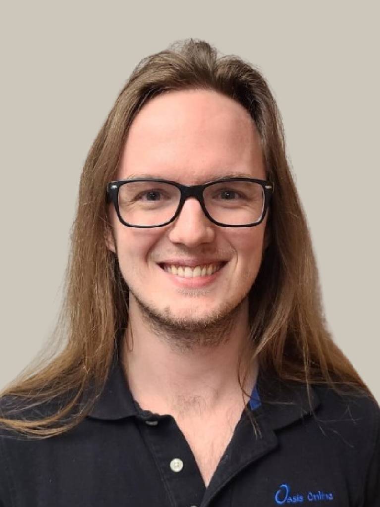 Person with long hair wearing glasses