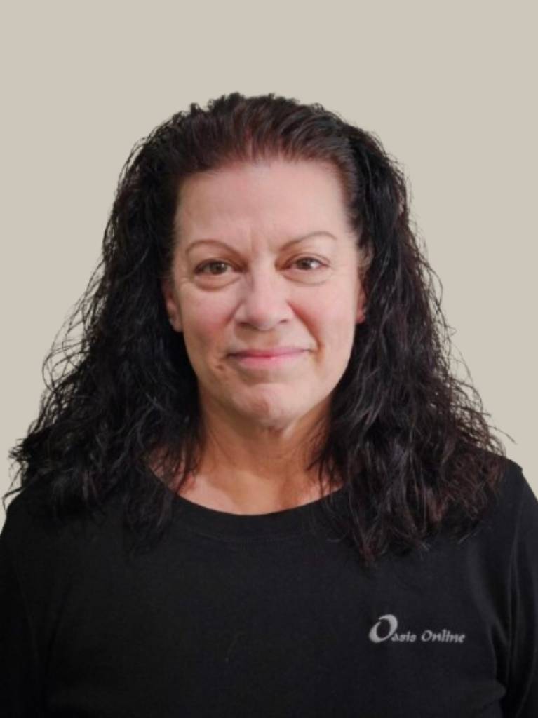 Portrait of smiling woman with dark curly hair